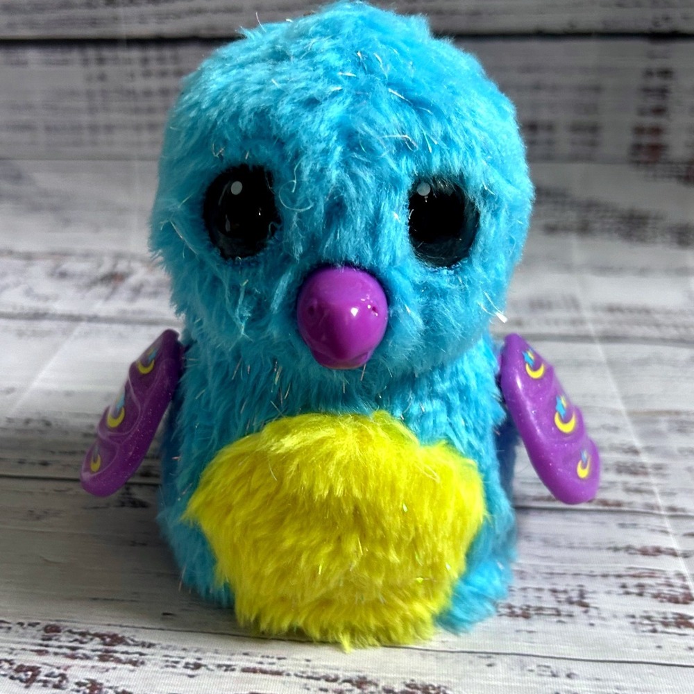 Spin Master HATCHIMALS Glimmering Garden Teal Draggle Interactive Plush Toy